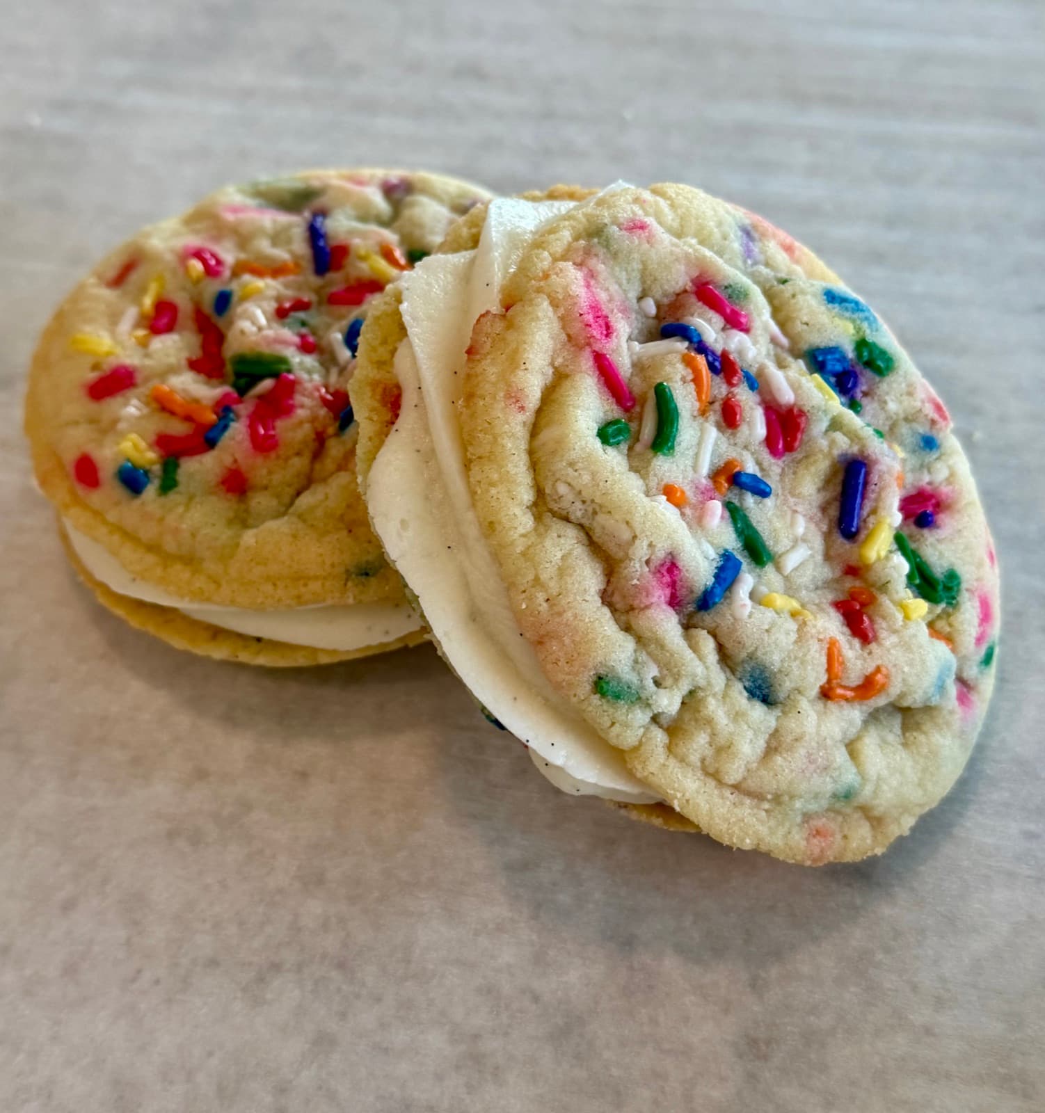 Funfetti sandwich cookies with vanilla buttercream from Wild Crumb Cookie Co